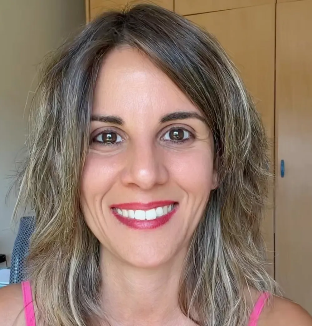 Laia Martí sonriendo, terapeuta y Facilitadora de Activación Kundalini y PSYCH-K®